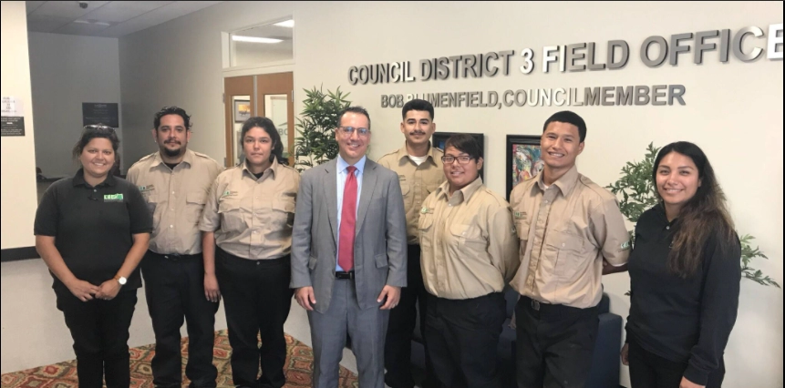 Blumenfield posing with the LA Conservation Corps